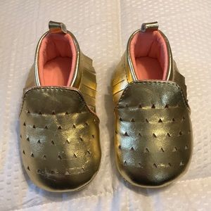 Target gold moccasins.